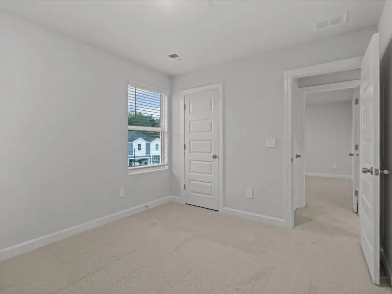 Spacious, unfurnished interior of a new home in The Farm at Wells Creek - Heritage Collection, Gray Court (Image 17).