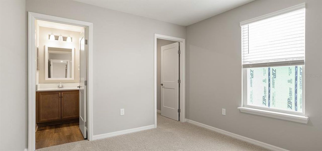 Spacious, unfurnished interior of a new home in Estates at Hickory Cove - Bungalows, St. Cloud (Image 12).