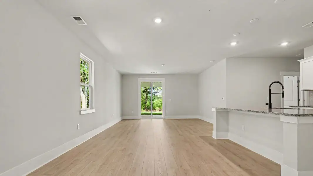 Representative unfurnished interior of a home built from the Woodstock by D.R. Horton in Riverlake, Supply (Image 8).