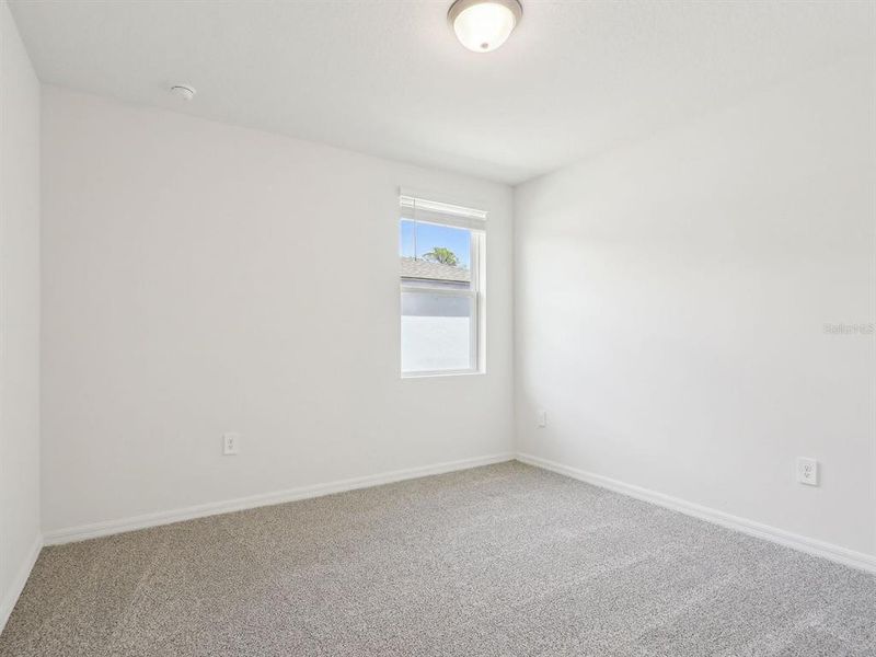 Spacious, unfurnished interior of a new home in The Reserve at Van Oaks, Auburndale (Image 20).