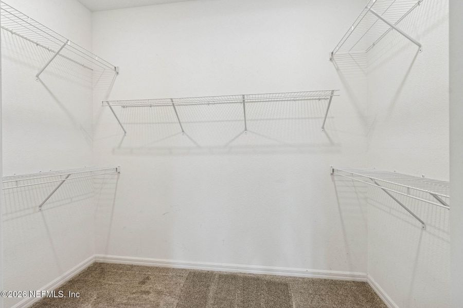 Spacious, unfurnished interior of a new home in Del Webb Wildlight, Wildlight (Image 31).