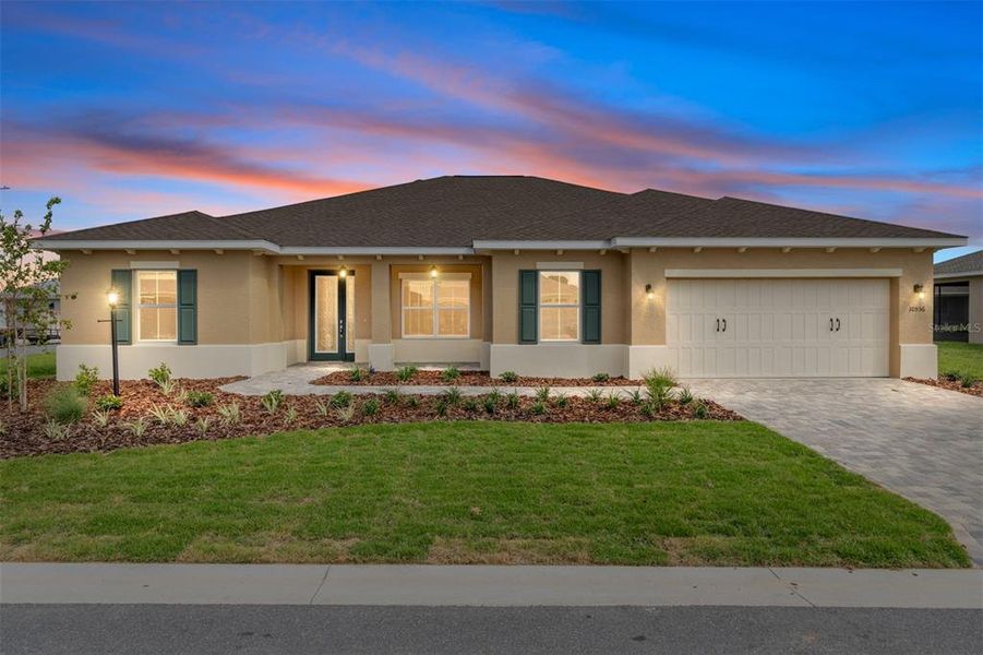 Front exterior of a new home in On Top of the World Communities, Ocala, FL, highlighting curb appeal (Image 15).