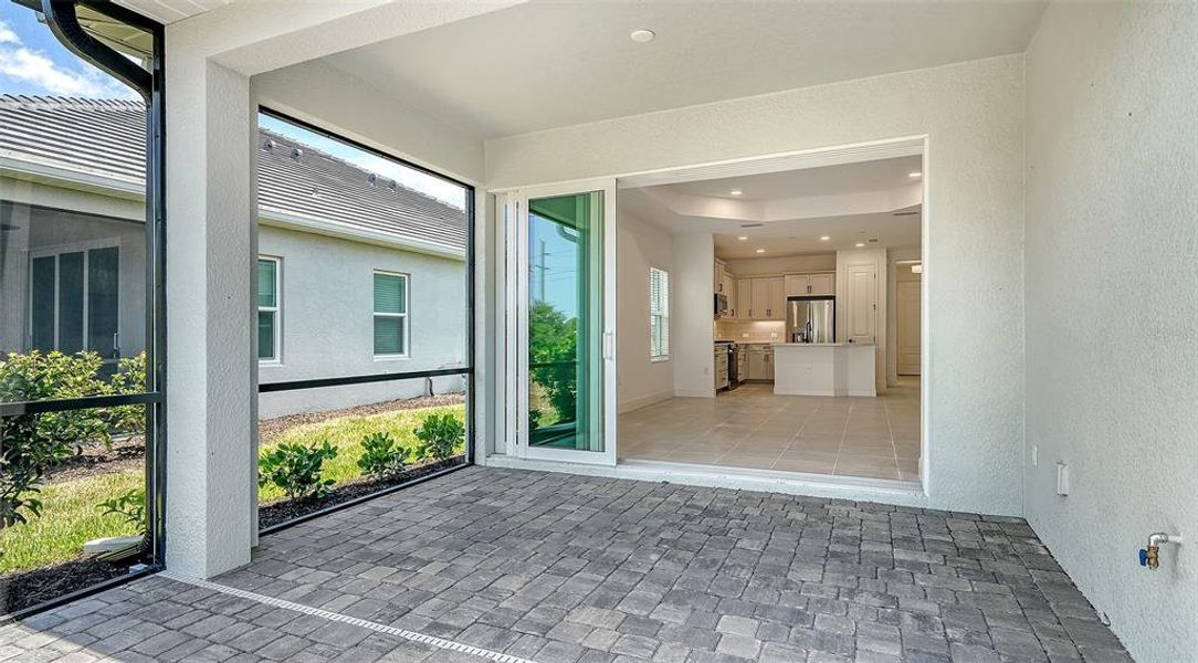 Exterior details and patio area of a home in Windward Real Estate and Homes for Sale in Sarasota, FL - Neal Communities, Lakewood Ranch (Image 24).