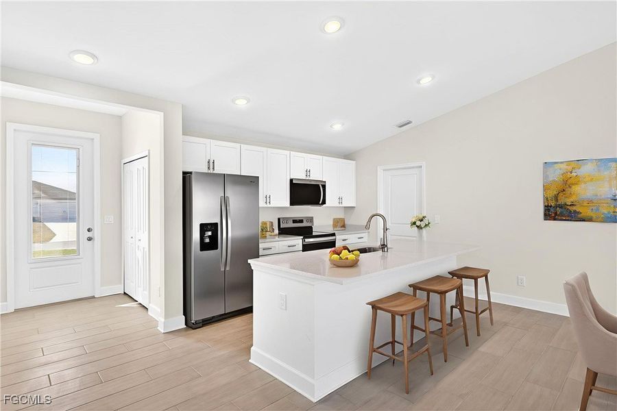Furnished interior view inside a new home in Cape Coral, Cape Coral (Image 6). Furnished interior view inside a new home in Cape Coral, Cape Coral (Image 6).