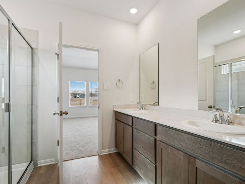 Furnished interior view inside a new home in Riverbend at Double Eagle - Reserve Collection, Cedar Creek (Image 3).