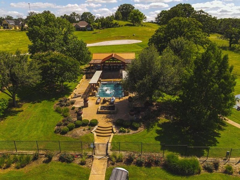 View from above of property featuring a pool area