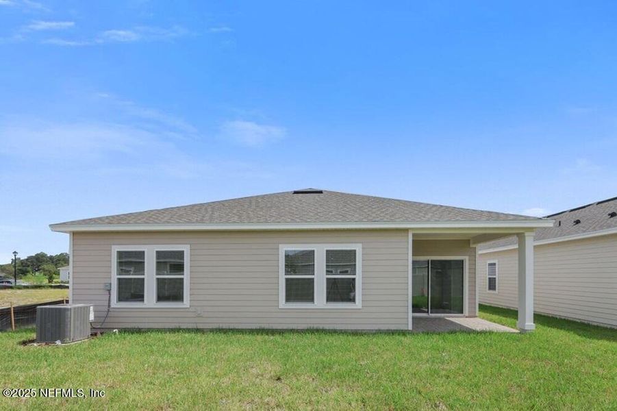 Exterior details and patio area of a home in Coopers Meadow, Jacksonville (Image 2).