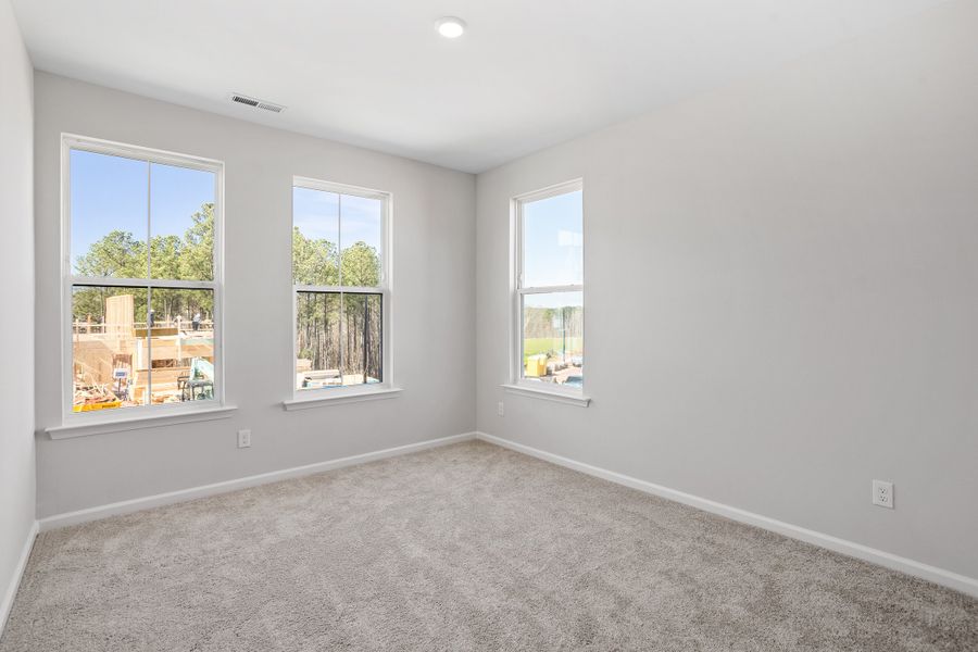 Spacious, unfurnished interior of a new home in Sweetbrier, Durham (Image 28).