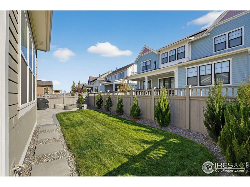 Exterior details and patio area of a home in Westerly, Erie (Image 24).