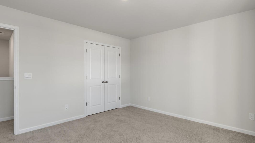 Spacious, unfurnished interior of a new home in The Haven at Indigo Preserve, Leland (Image 38).