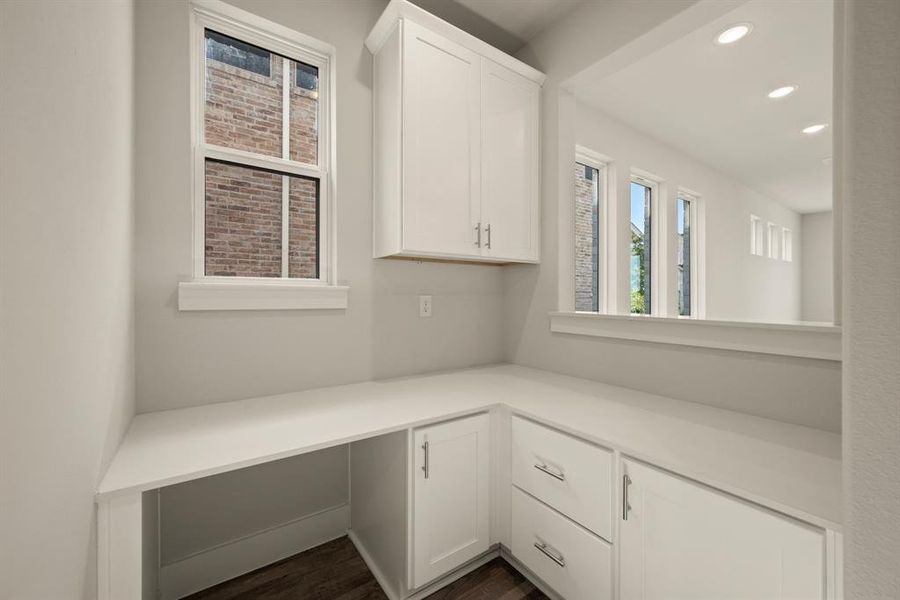 Our Alexander plan offers a built in pocket office that makes working from home a breeze! Our Alexander plan offers a built in pocket office that makes working from home a breeze!