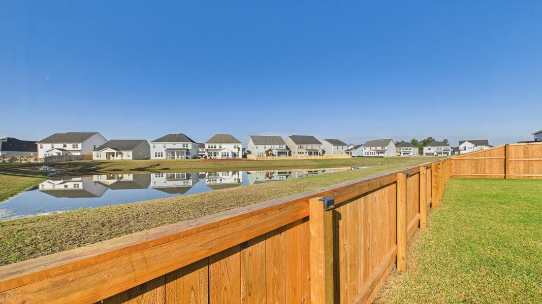 Exterior details and patio area of a home in Hewing Farms, Summerville (Image 28).