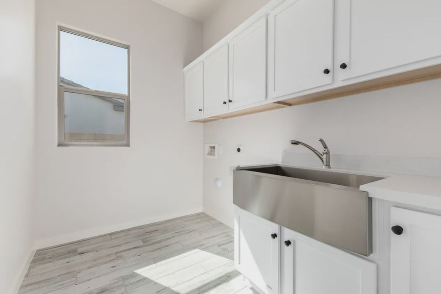 Furnished interior view inside a new home in Valencia at Granite Vista, Waddell (Image 11).