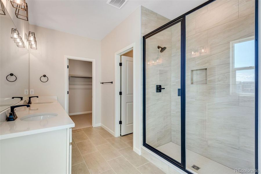Furnished interior view inside a new home in Wild Oak at The Canyons, Castle Pines (Image 11). Furnished interior view inside a new home in Wild Oak at The Canyons, Castle Pines (Image 11).
