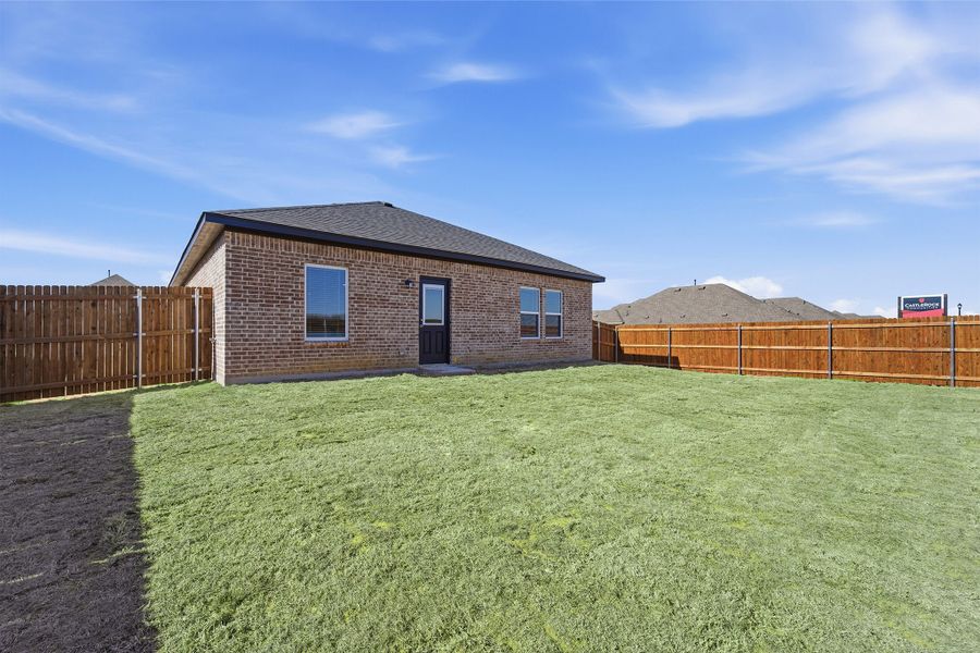 Exterior details and patio area of a home in Pebblebrook, Sherman (Image 3).