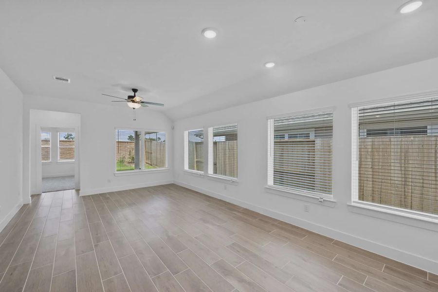 Representative unfurnished interior of a home built from the Carriagehouse by Chesmar Homes in Meridiana Townhomes, Iowa Colony (Image 22).