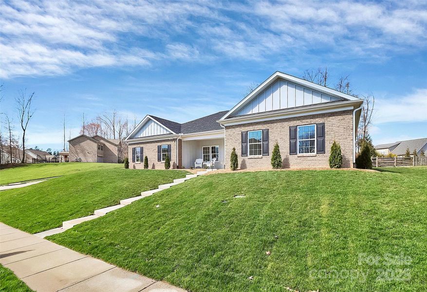 Front exterior of a new home in , Rock Hill, SC, highlighting curb appeal (Image 25).
