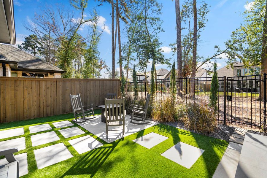 Exterior details and patio area of a home in The Highlands - Grove Collection, Porter (Image 3).
