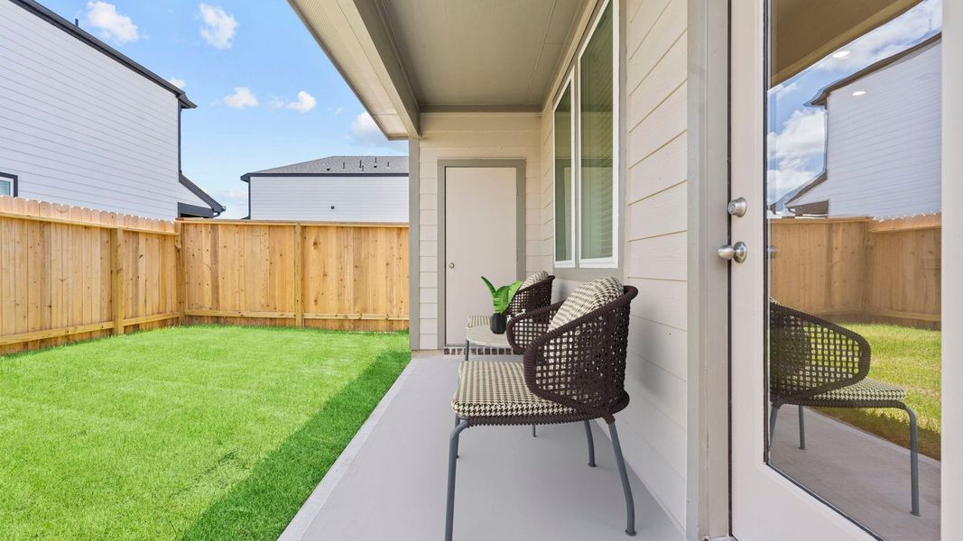 Exterior details and patio area of a home in Lexington Village, Missouri City (Image 2).