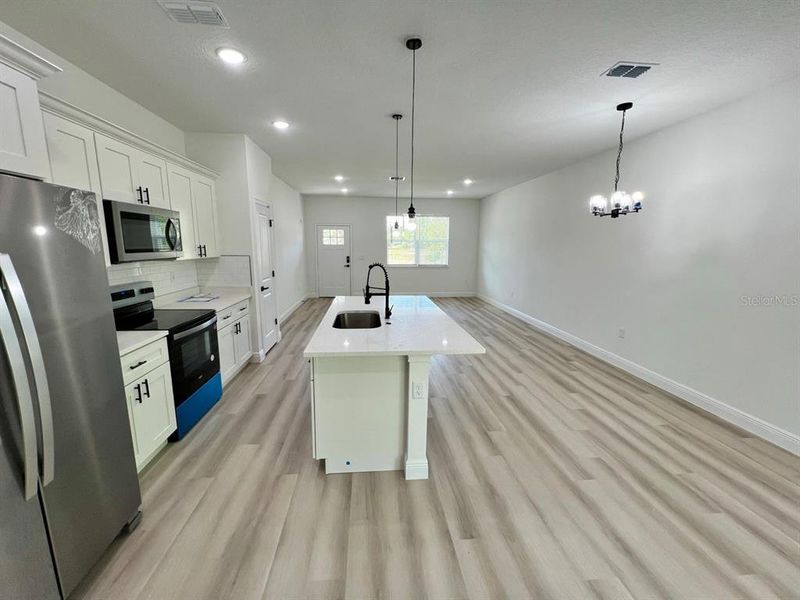 Furnished interior view inside a new home in , Citrus Springs (Image 4).