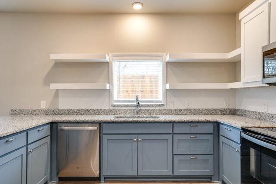 Kitchen with stainless steel appliances