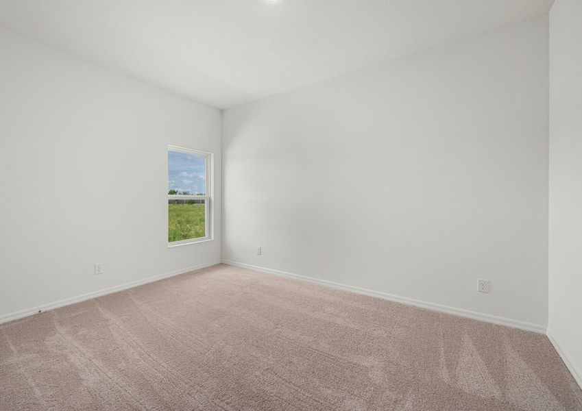 Bedroom with lush carpet Bedroom with lush carpet