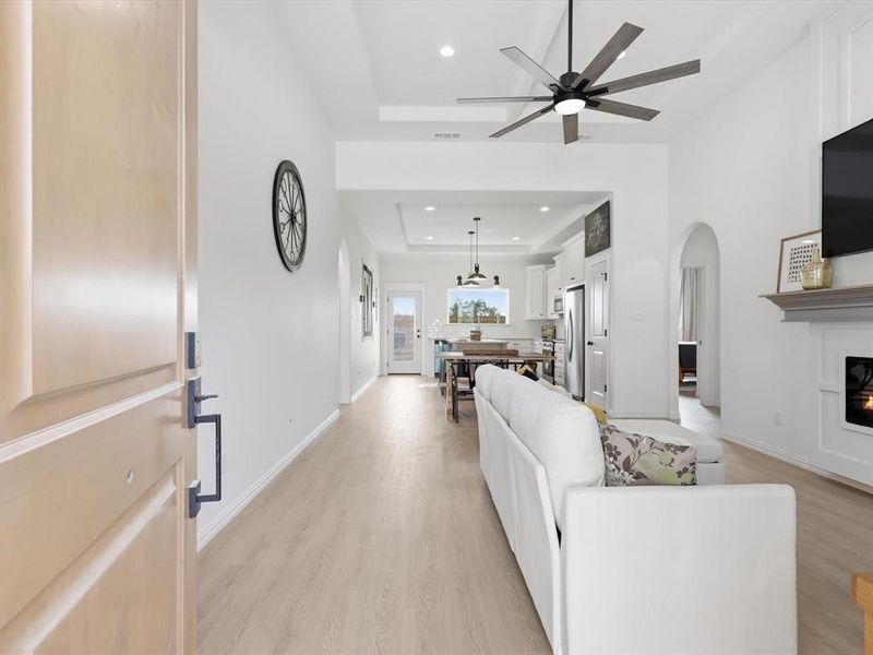 Coffered ceilings and natural light solidify the luxurious feel of this home.