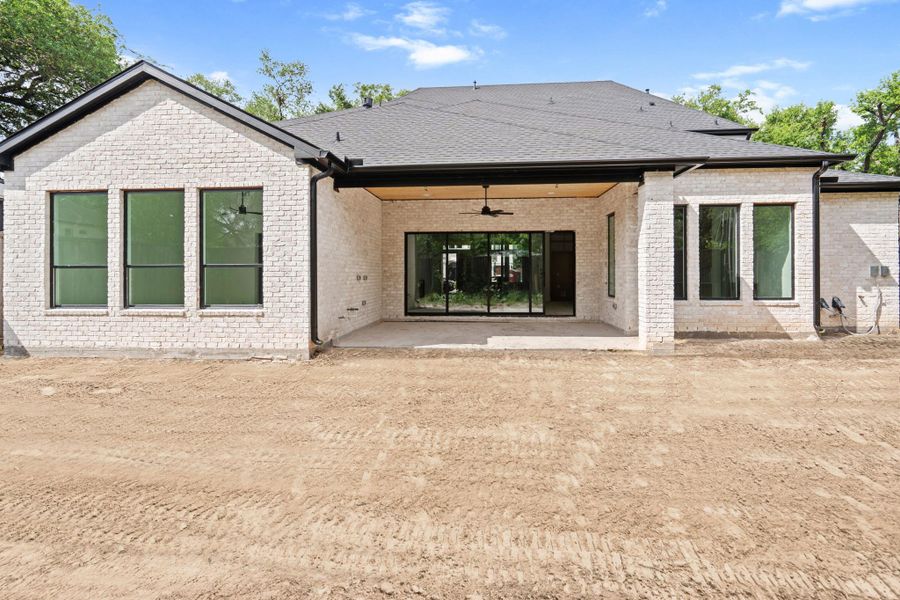 Exterior details and patio area of a home in , Houston (Image 11). Exterior details and patio area of a home in , Houston (Image 11).