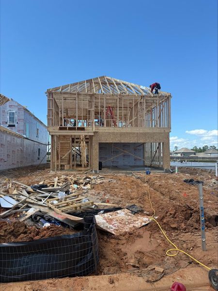 In-progress construction of a new home in River's Edge, Conroe, TX (Image 25).