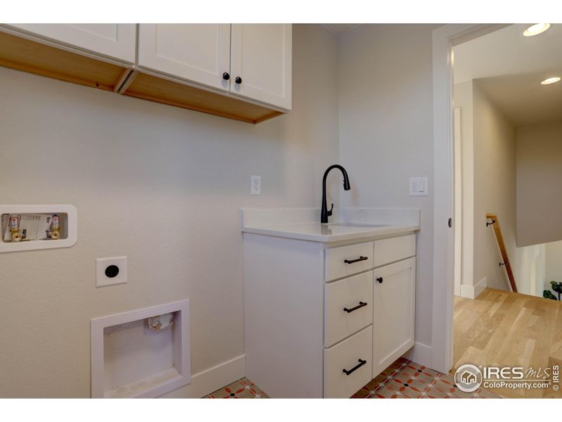 Upper level laundry room, yes!