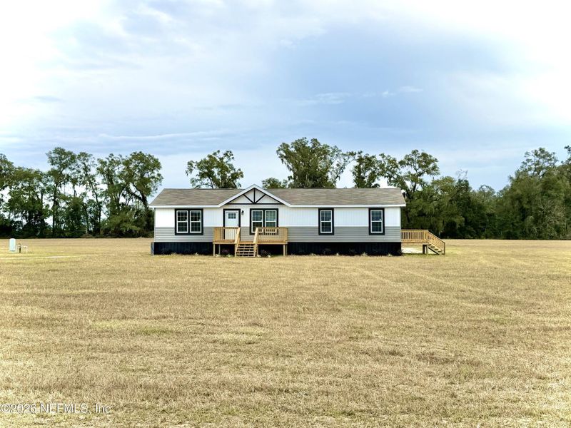 Exterior details and patio area of a home in , Brooker (Image 22).