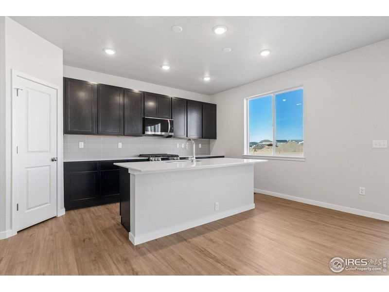 Furnished interior view inside a new home in Prairie Song, Windsor (Image 9).
