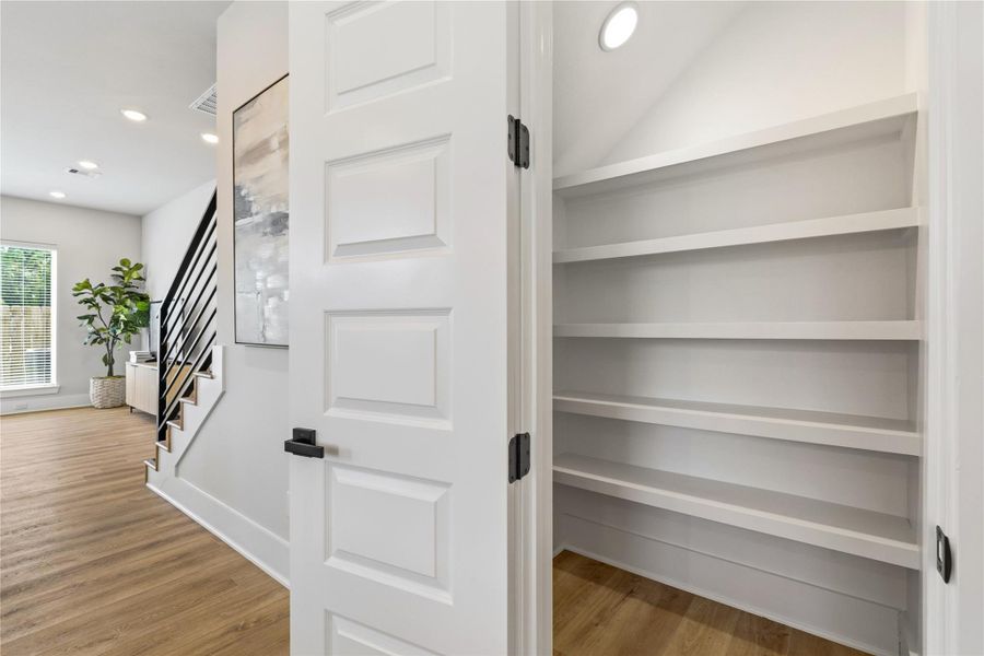 A dedicated walk-in pantry offers additional storage rarely found in comparable new construction, adding both convenience and long-term usability. A dedicated walk-in pantry offers additional storage rarely found in comparable new construction, adding both convenience and long-term usability.