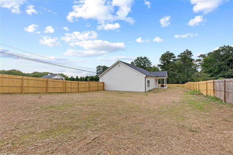 Exterior details and patio area of a home in , Douglasville (Image 27).