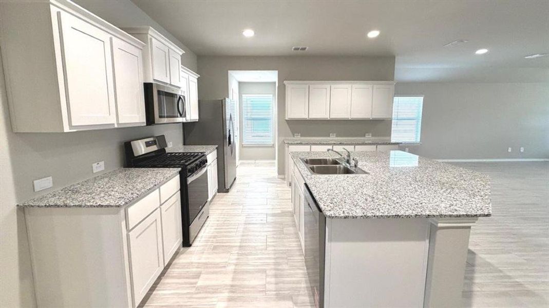 Kitchen - All Home and community information, including pricing, included features, terms, availability and amenities, are subject to change at any time without notice or obligation. All Drawings, pictures, photographs, video, square footages, floor plans, elevations, features, colors and sizes are approximate for illustration purposes only and will vary from the homes as built.