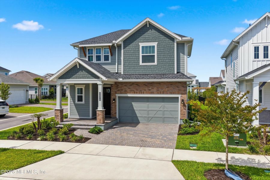 Front exterior of a new home in , Jacksonville, FL, highlighting curb appeal (Image 1). Front exterior of a new home in , Jacksonville, FL, highlighting curb appeal (Image 1).