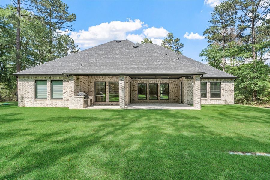 Exterior details and patio area of a home in , Plantersville (Image 24).