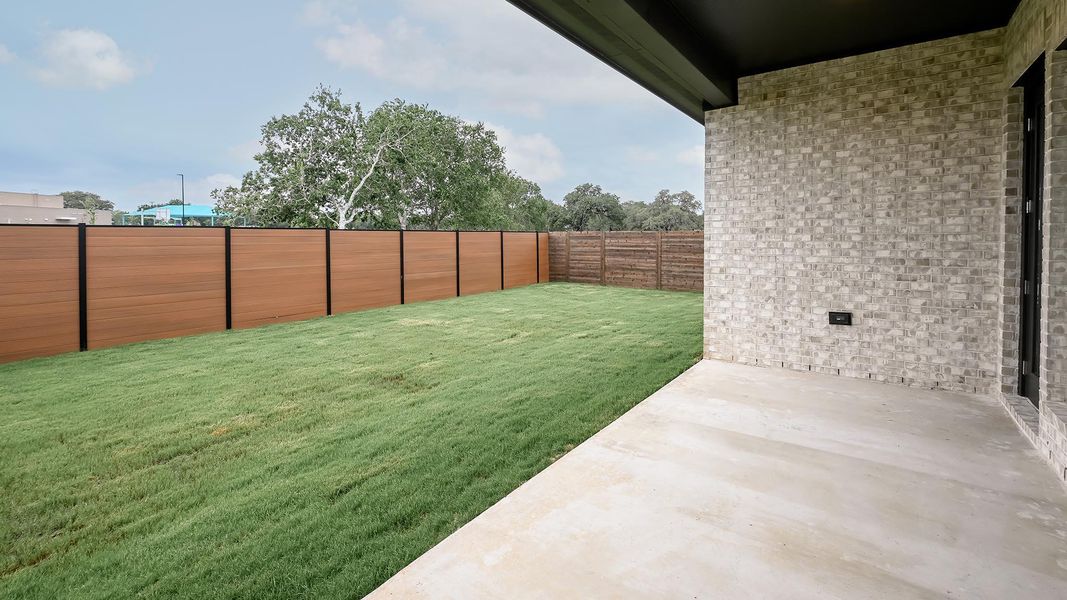 Exterior details and patio area of a home in Juniper Springs, Lockhart (Image 2).