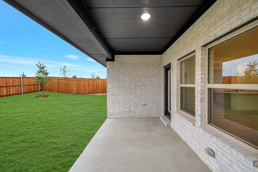 Exterior details and patio area of a home in Aspire at Noble Ridge, Howe (Image 2).