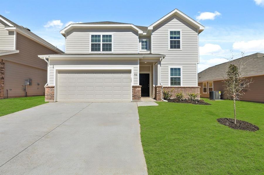 Front exterior of a new home in Retreat at Fossil Creek, Fort Worth, TX, highlighting curb appeal (Image 12). Front exterior of a new home in Retreat at Fossil Creek, Fort Worth, TX, highlighting curb appeal (Image 12).