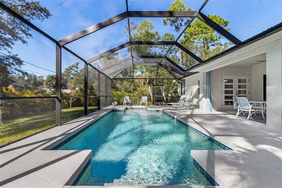 Exterior details and patio area of a home in , Port Charlotte (Image 1).