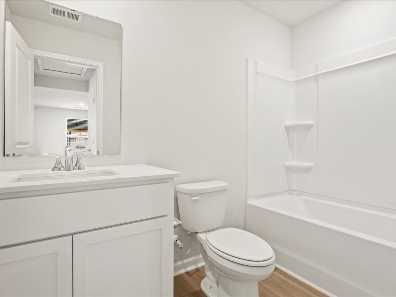 Furnished interior view inside a new home in Brayfield Manor - Heritage Collection, Wellford (Image 7).