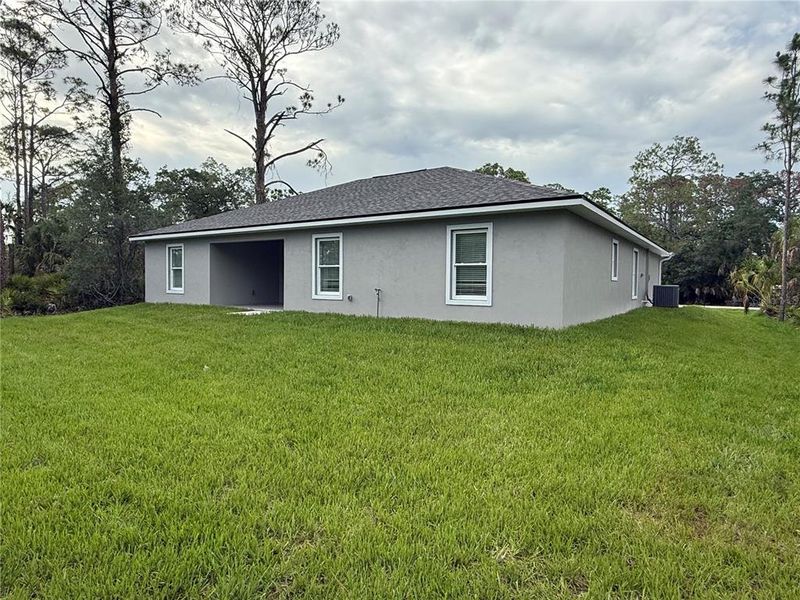 Exterior details and patio area of a home in , Port Charlotte (Image 4).