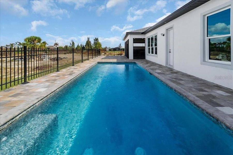 Exterior details and patio area of a home in , Port Charlotte (Image 28).