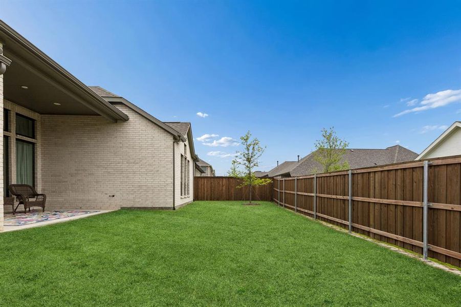 Exterior details and patio area of a home in , Lavon (Image 26).