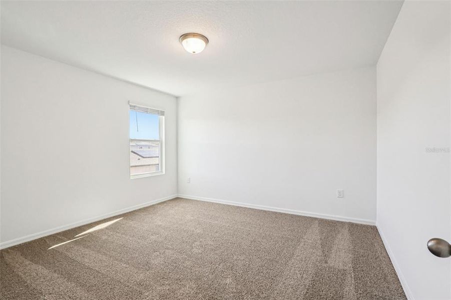 Spacious, unfurnished interior of a new home in Lake Deer Estates - Classic Series, Poinciana (Image 18).