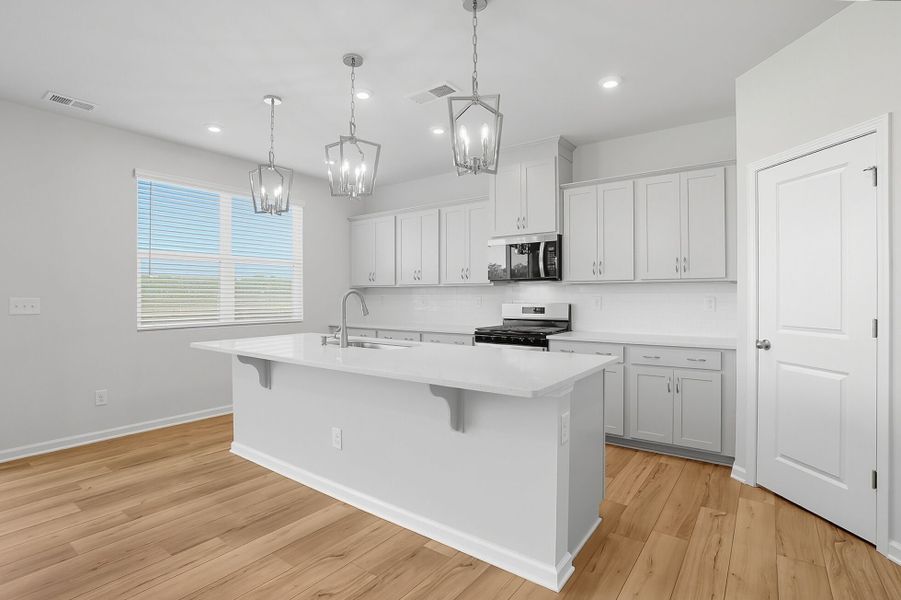 Furnished interior view inside a new home in Waxhaw Landing, Monroe (Image 3).