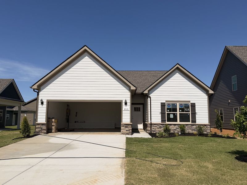 Front exterior of a new home in Salem Landing, Rockvale, TN, highlighting curb appeal (Image 2). Front exterior of a new home in Salem Landing, Rockvale, TN, highlighting curb appeal (Image 2).