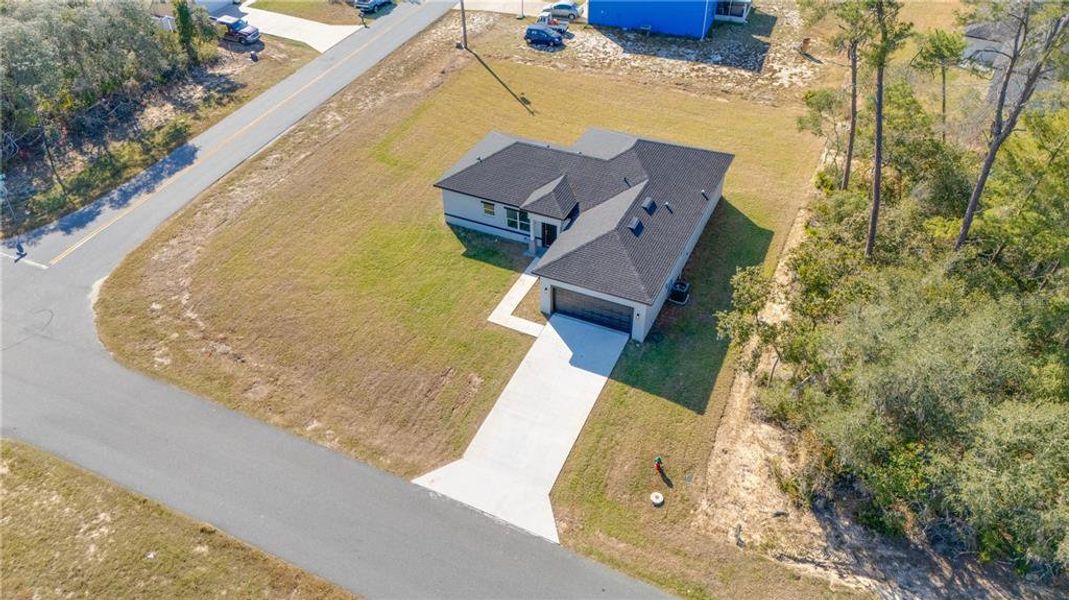 Front exterior of a new home in , Ocala, FL, highlighting curb appeal (Image 12). Front exterior of a new home in , Ocala, FL, highlighting curb appeal (Image 12).