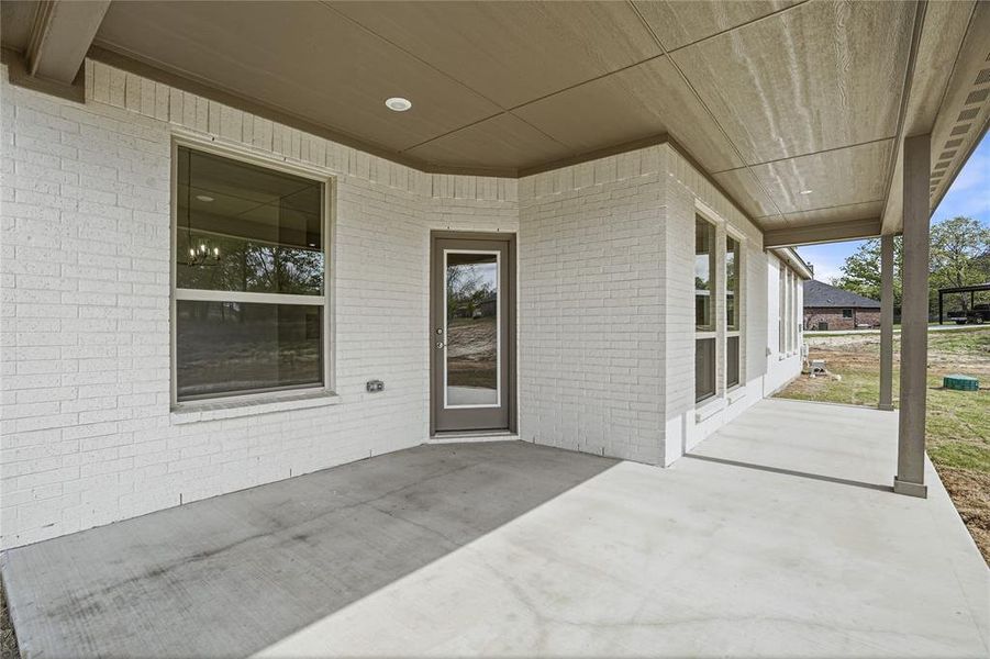 Exterior details and patio area of a home in Arbor Oaks, Boyd (Image 3).